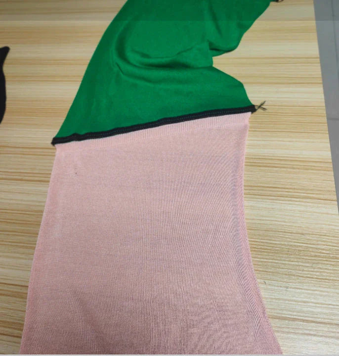Stylish two-piece knit jumpsuit in a variety of vibrant colors, featuring a split-front top and comfortable shorts