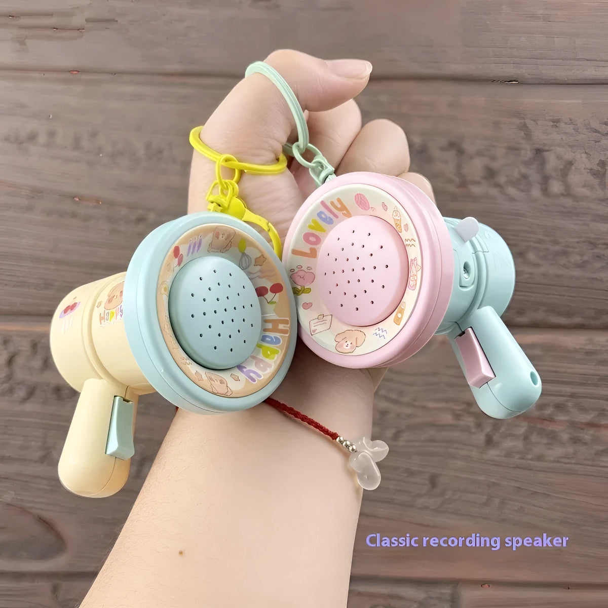 Green and yellow plastic cartoon horn keychain with recording function