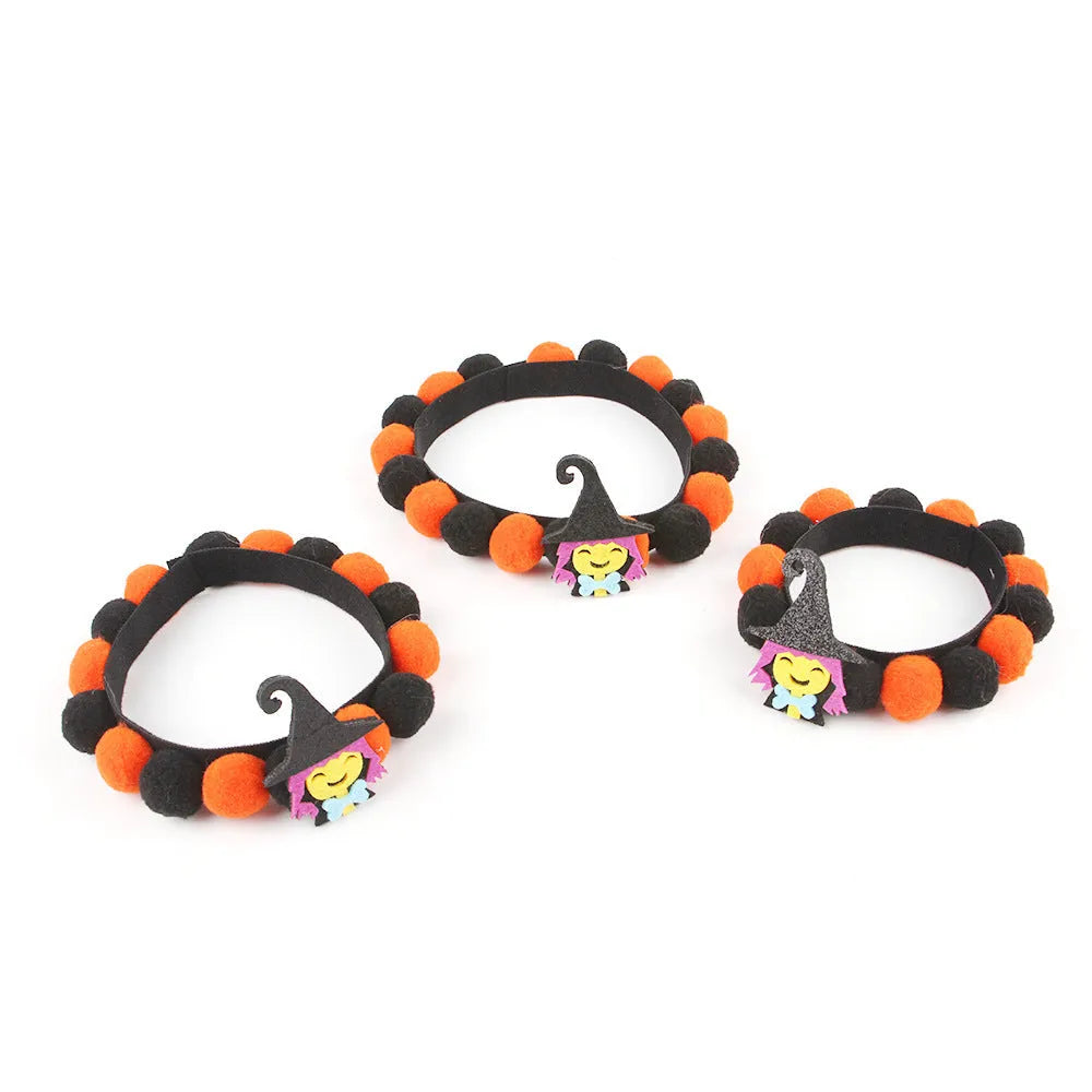 Halloween pet collar with fur ball decoration in pumpkin design