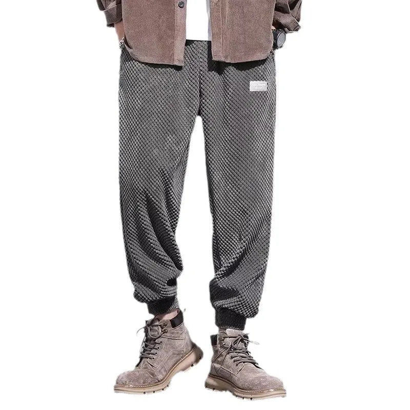 Men's grey ankle-tied sweatpants with straight leg cut and non-ironing fabric