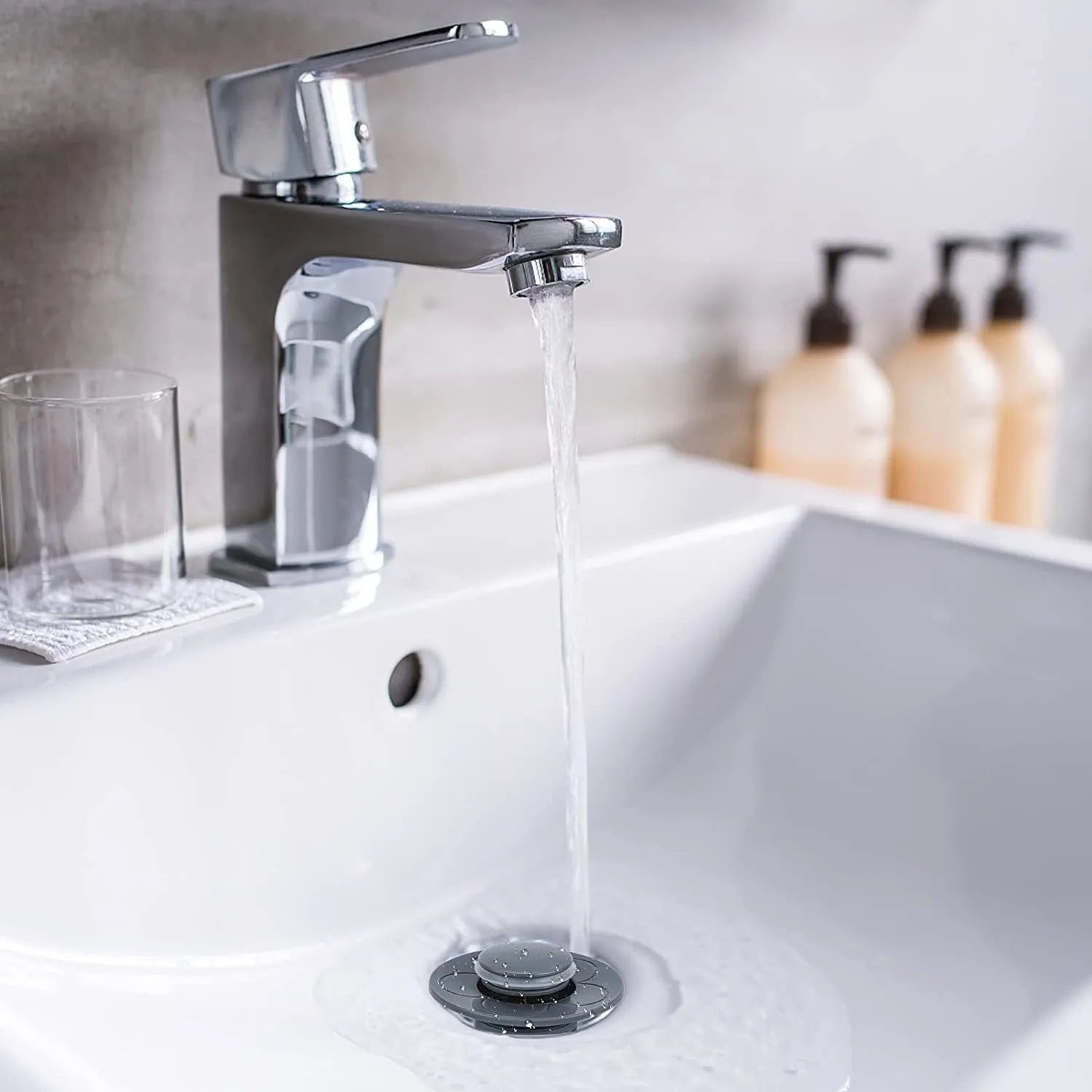 Copper core bouncing washbasin drain plug with universal 1.1-1.5 inch head in metallic finish