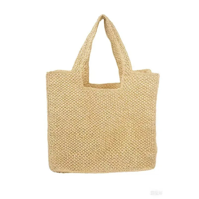 Woven straw tote bag in horizontal square shape with double shoulder straps measuring 40x36x12cm