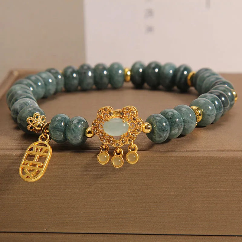 Women's natural emerald jade bracelet with abacus bead design and safety lock clasp