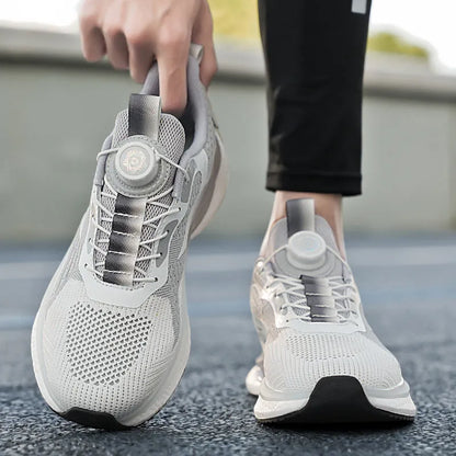 Men's white low-top running sneakers with a buckle fastener and mesh upper.