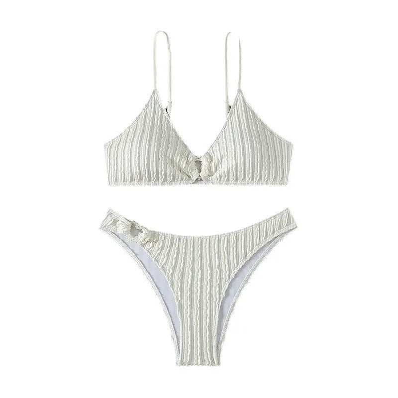 Women's white V-neck two-piece swimsuit with sleeveless top and matching shorts