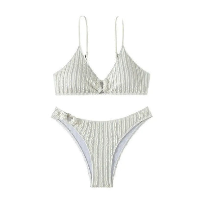 Women's white V-neck two-piece swimsuit with sleeveless top and matching shorts