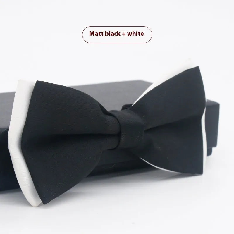 A solid colour pre-tied bow tie with an adjustable neck strap, shown in a classic flat head shape.