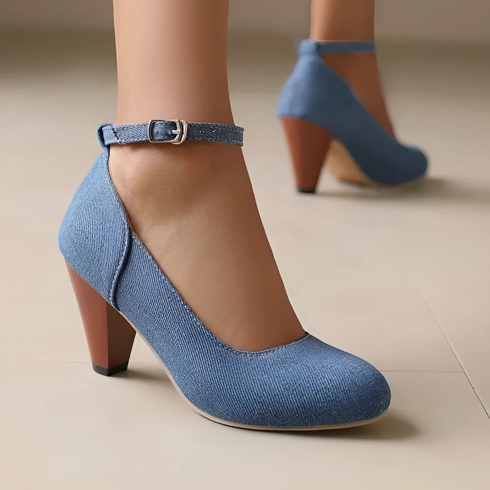 Women's blue denim platform heels with buckle closure and waterproof sole