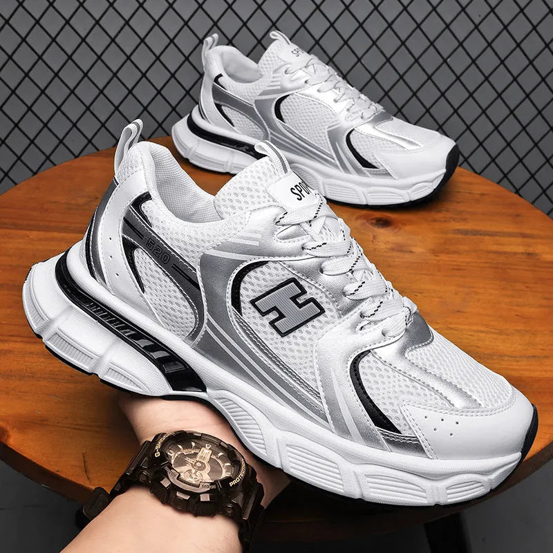 Men's mesh running shoes with plastic sole in black, white and grey, or white and orange colours