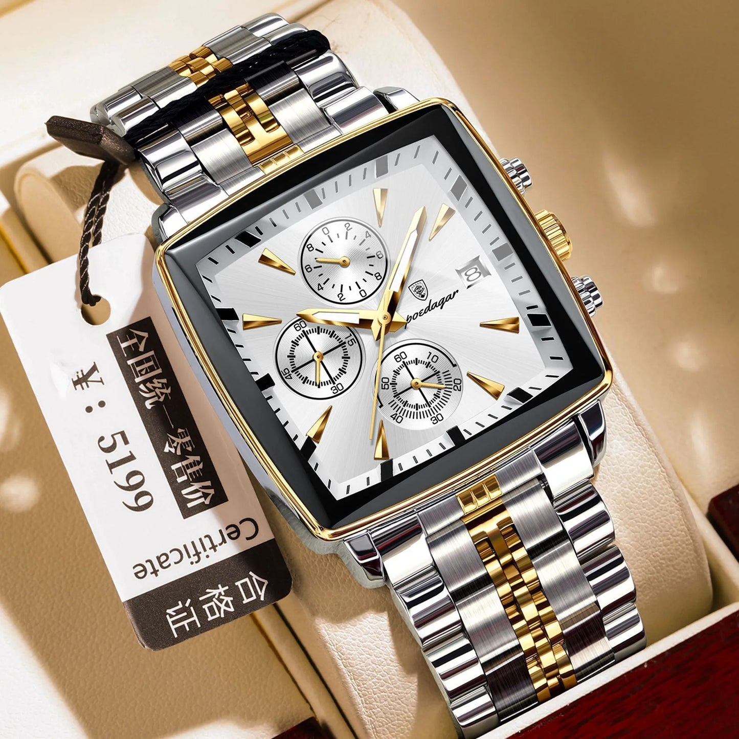 Square men's business watch with stainless steel strap and alloy case in a gold and blue colour variant.