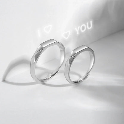 Elegant S925 sterling silver rings with a hidden love pattern design, adjustable sizing for a personalized fit.