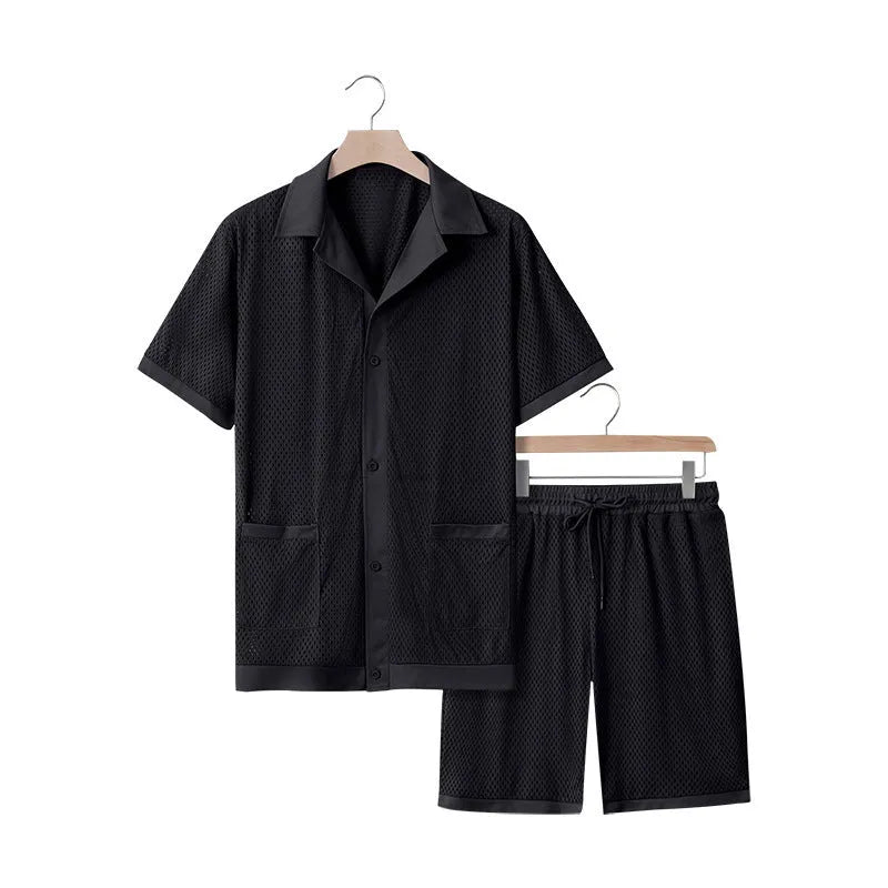 Light blue see-through beach shorts suit with matching cardigan on a summer background.