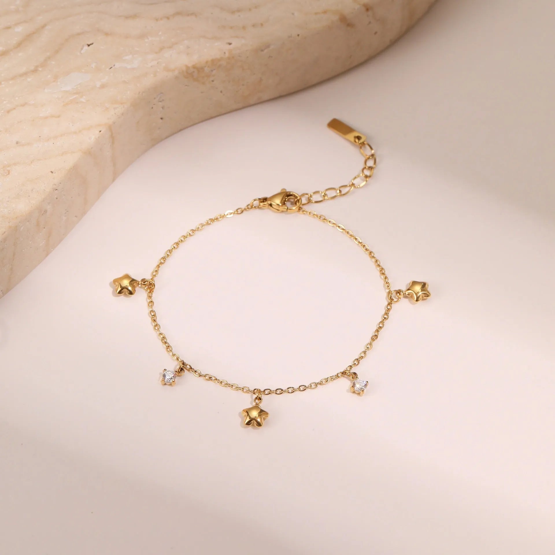 Titanium steel women's bracelet with hexagonal star pendant and 18K gold plating