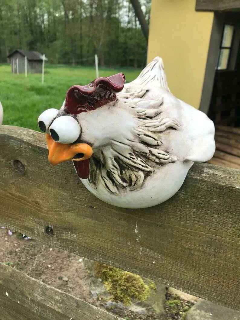 Resin chicken garden ornament with vibrant colours and charming design, adding whimsical appeal to outdoor British garden display