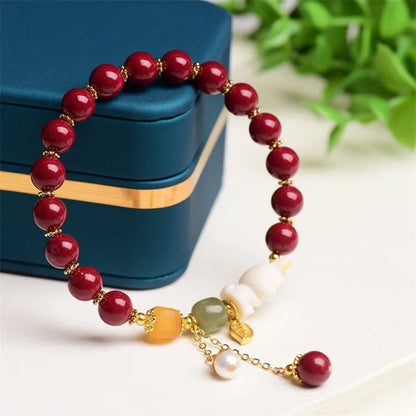 Traditional Chinese cinnabar bracelet with bunny design in purple-gold sand colour