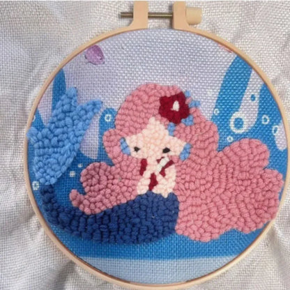Beginner embroidery craft suit showing six cartoon designs including turtle, sheep, horse, fox, butterfly, and mermaid patterns