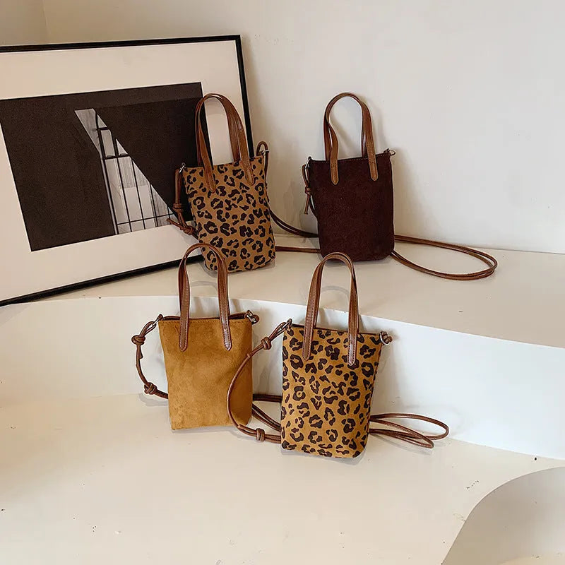 Women's retro leopard print crossbody bag with 166cm strap, square vertical PU shoulder bag in khaki or brown