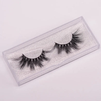 Affectionate brand 5D mink false eyelashes with a hair cap and double-headed brush on a pink background.