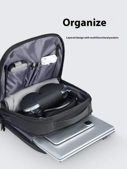 Graphite grey USB business backpack with Oxford cloth exterior showing sewing thread details and charging port