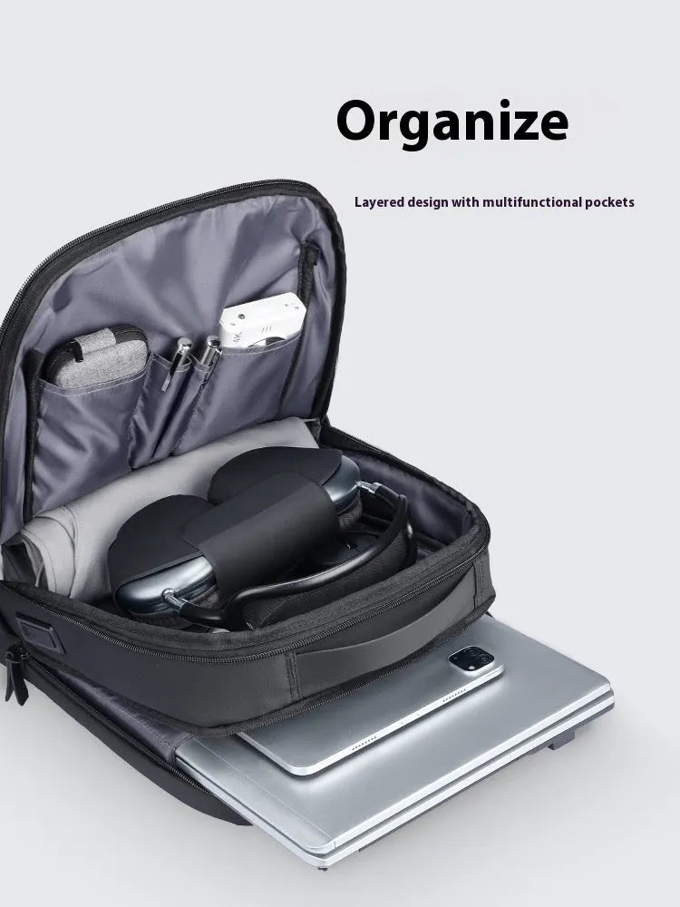 USB large capacity business backpack with 20L storage made from Oxford cloth, featuring an external charging port and graphite grey colour, designed for work and daily commuting