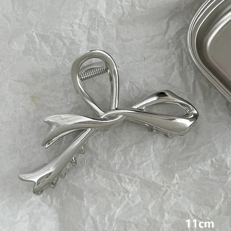 Silver metal hair claw barrette example from a range of 44 Korean-style designs.