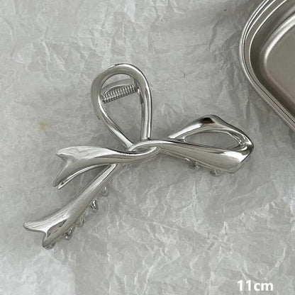 Silver metal hair claw barrette example from a range of 44 Korean-style designs.