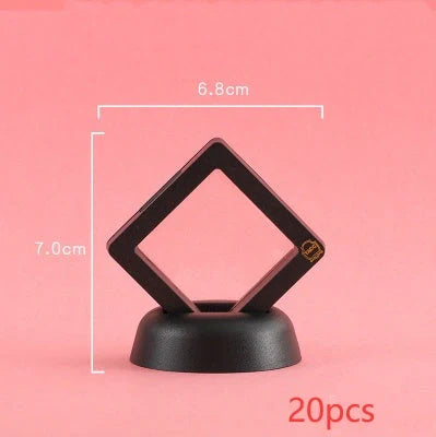 3D floating jewelry coin display stand in white and black, showcasing collectibles in mid-air