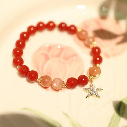 Handmade red agate and sunstone ethnic bracelet with star and Xiangyun designs for women