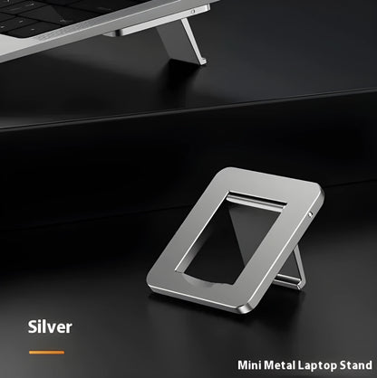 Compact foldable aluminium alloy laptop stand bracket shown with adhesive backing