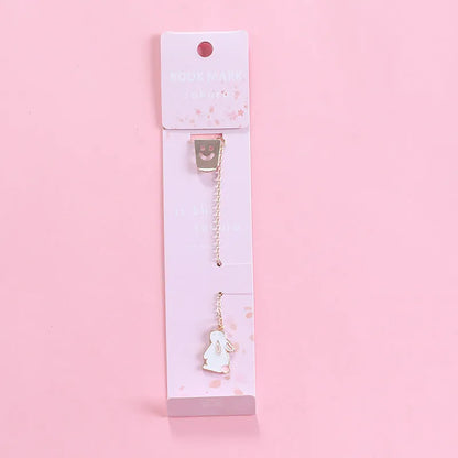 Alloy metal cartoon pendant bookmark with colourful charms including panda, rocket, and wishing bottle designs