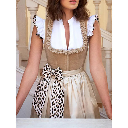 Khaki coloured women's Oktoberfest beer style dress on a hanger.