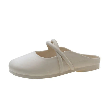 Women's baotou plastic flip-flop sandals in beige colour on a white background