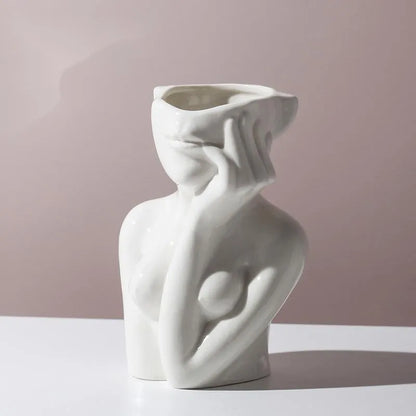 Human body shape ceramic vase with colour glazed finish in sculptural form