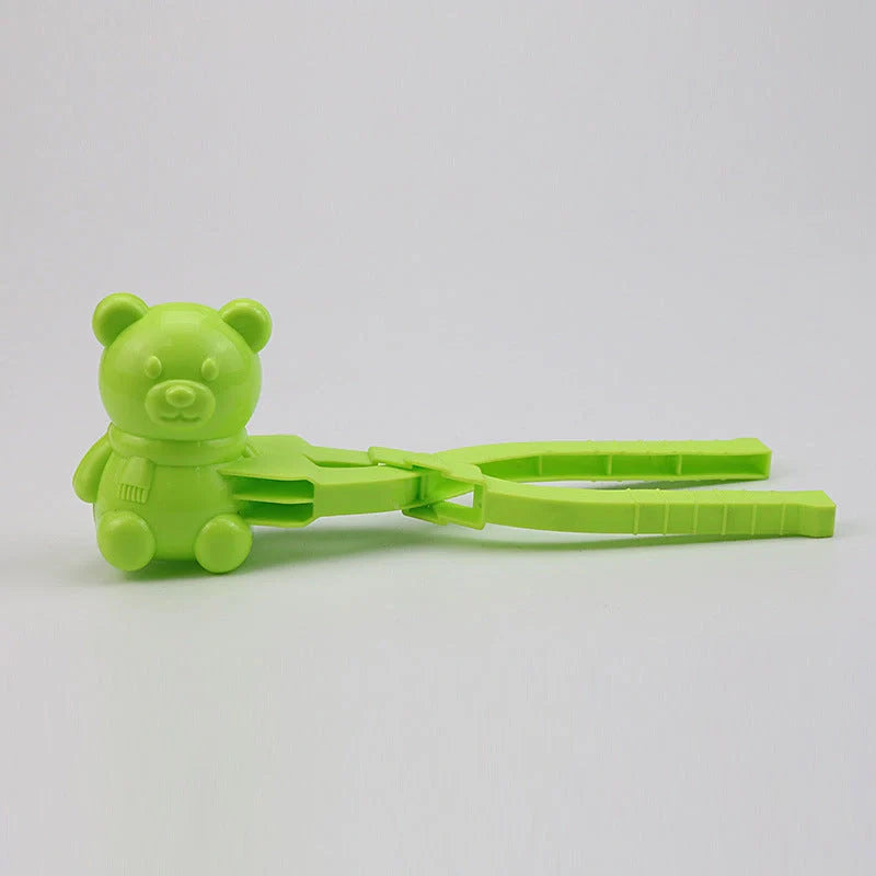 Red heart-shaped snowball maker clip for kids, perfect for winter play
