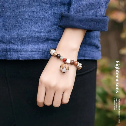 Women's 18-seed Bodhi seed bracelet with geometric pattern measuring 16cm wrist circumference