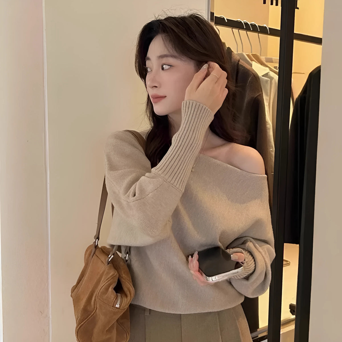 Women's long sleeve viscose pullover blouse in free size shown in one of seven colours.