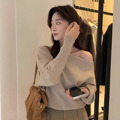 Women's long sleeve viscose pullover blouse in free size shown in one of seven colours.