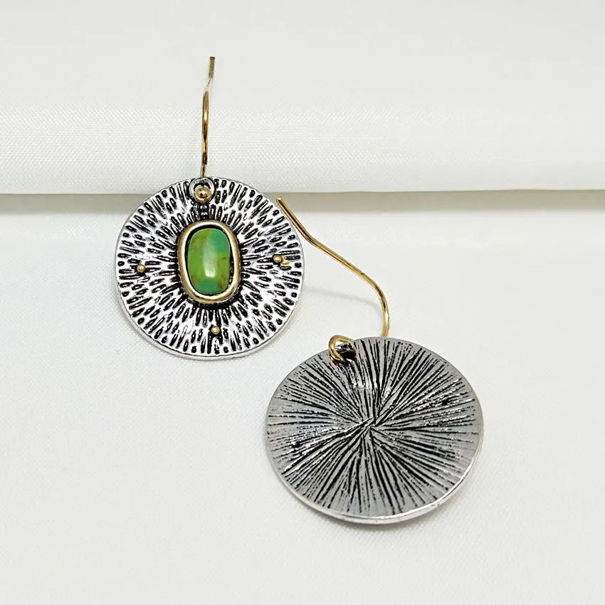 A pair of retro-style earrings with turquoise colour separation and an antique silver electroplated finish.
