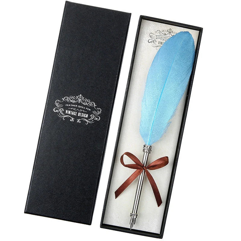 Elegant retro feather pen in a luxury gift box, featuring a sleek stainless steel casing and a stunning array of authentic feather designs.