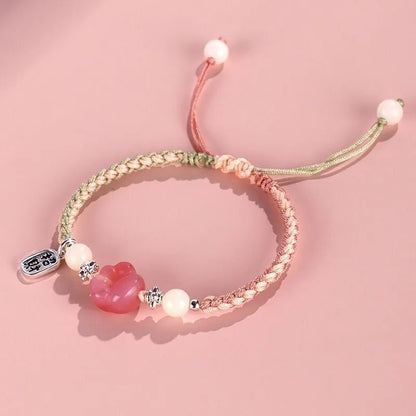 Handmade red cat's paw charm bracelet with glass beads in pink or yellow woven design