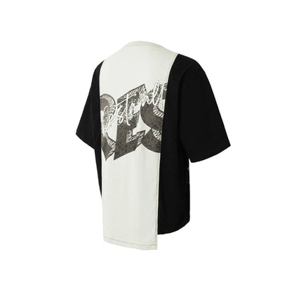 Black and white deconstruction print on a loose fit cotton blend t-shirt for streetwear.