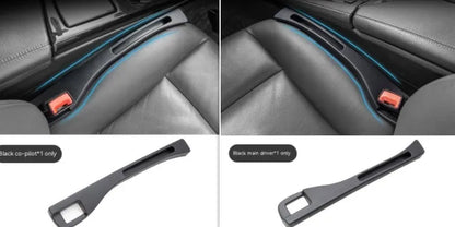 Black car seat gap storage box organiser with compartments and carrying handle between vehicle seats