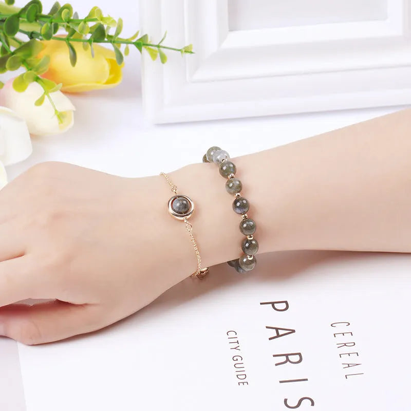 Double-layer women's bracelet with lucky beads and colourful crystals in gold-toned setting