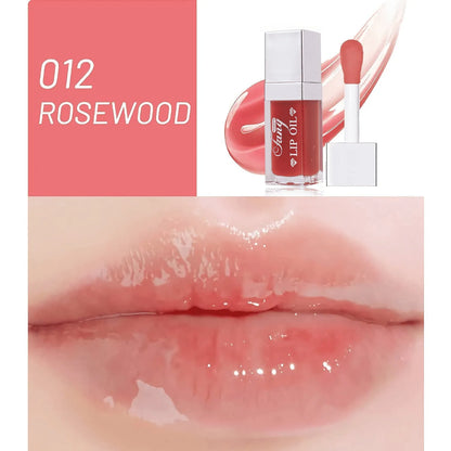 Set of five bright lip gloss tubes with lip essence oil applicators in shades Style001, 006, 007, 012, and 015.