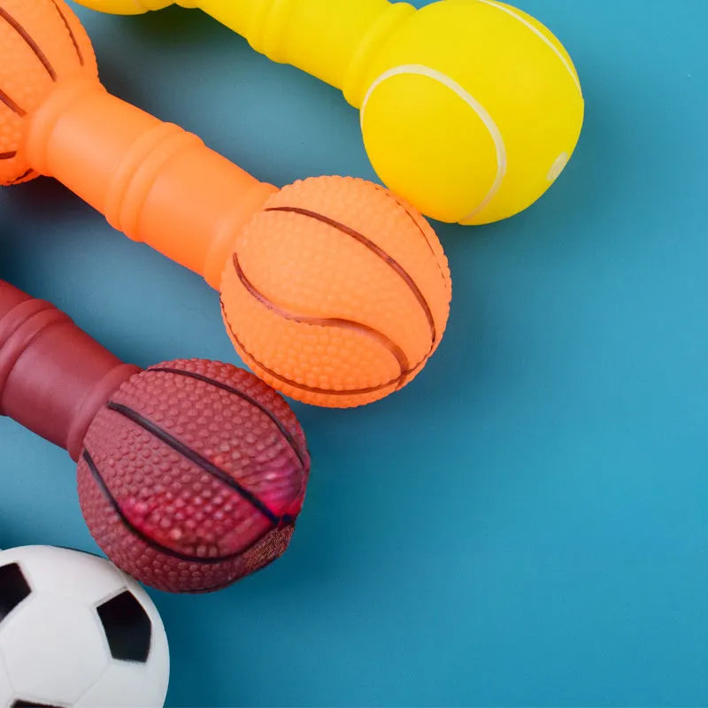 Non-toxic PVC football dumbbell shaped squeaky dog chew toy in brown, orange, white, or yellow.