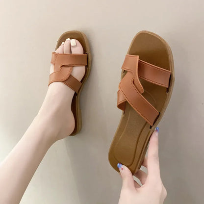 Women's PVC toe ring slippers with solid colour cross straps and non-slip sole