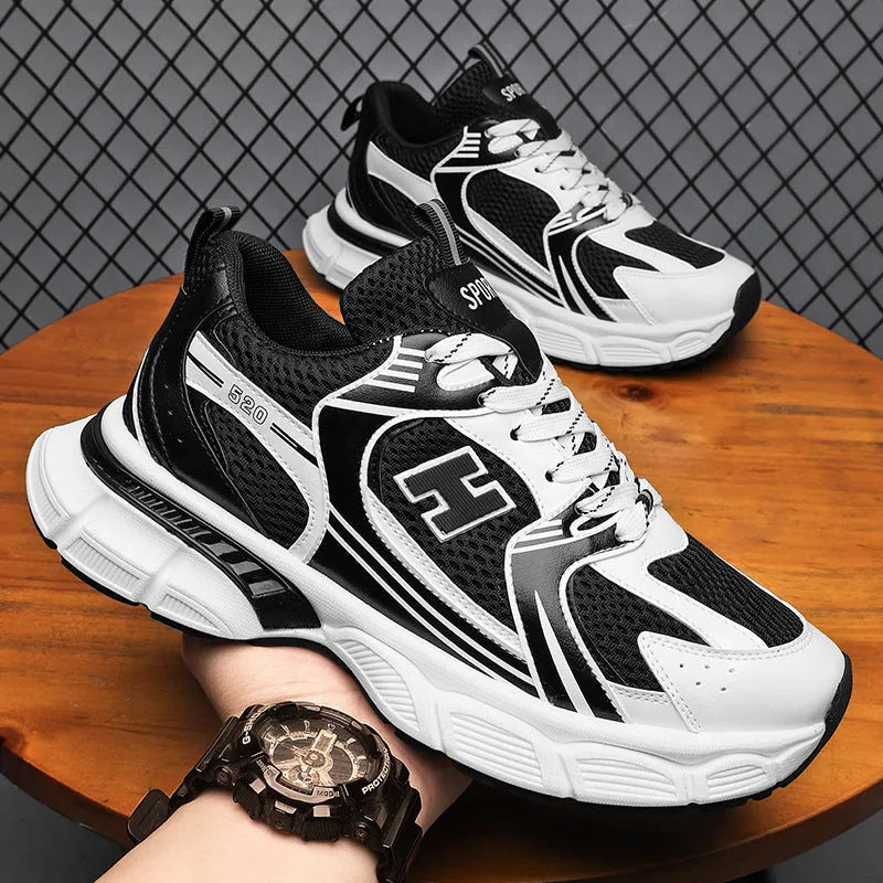 Men's running shoes mesh casual trainers injection moulded plastic sole round toe solid colour available in black, white and grey, or white and orange sizes 39 to 45 UK standard fitting