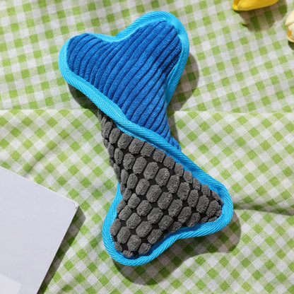 Blue plush teddy dog toy attached to a bone shape with corn fleece lining for bite-resistant chewing.