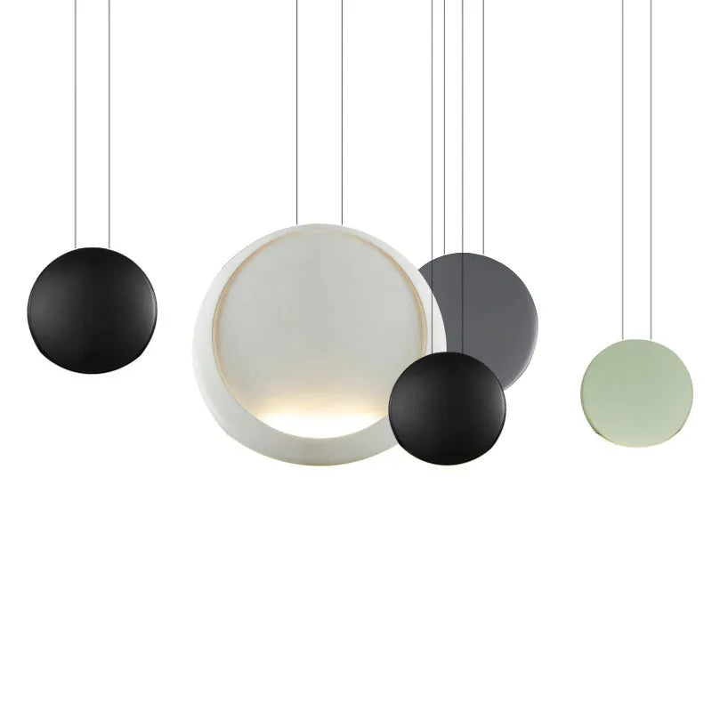 Cosmos design resin bedroom chandelier with round bar, trumpets, and spheres, showing adjustable height.