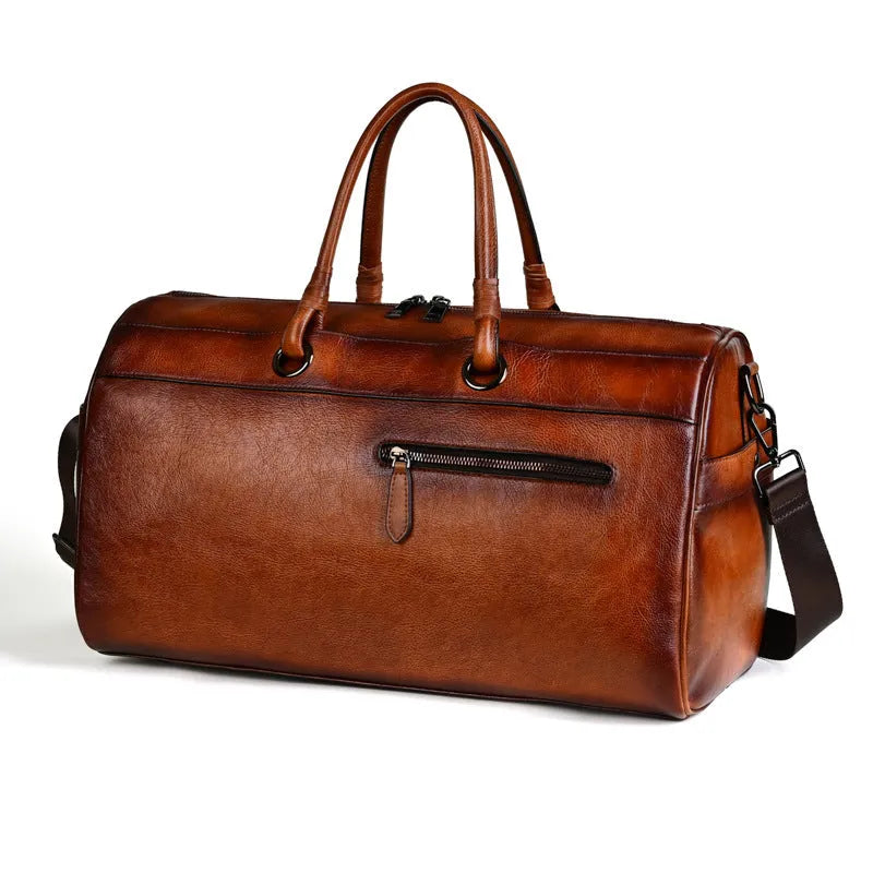 Handmade brown retro leather tote bag with large capacity for travel.